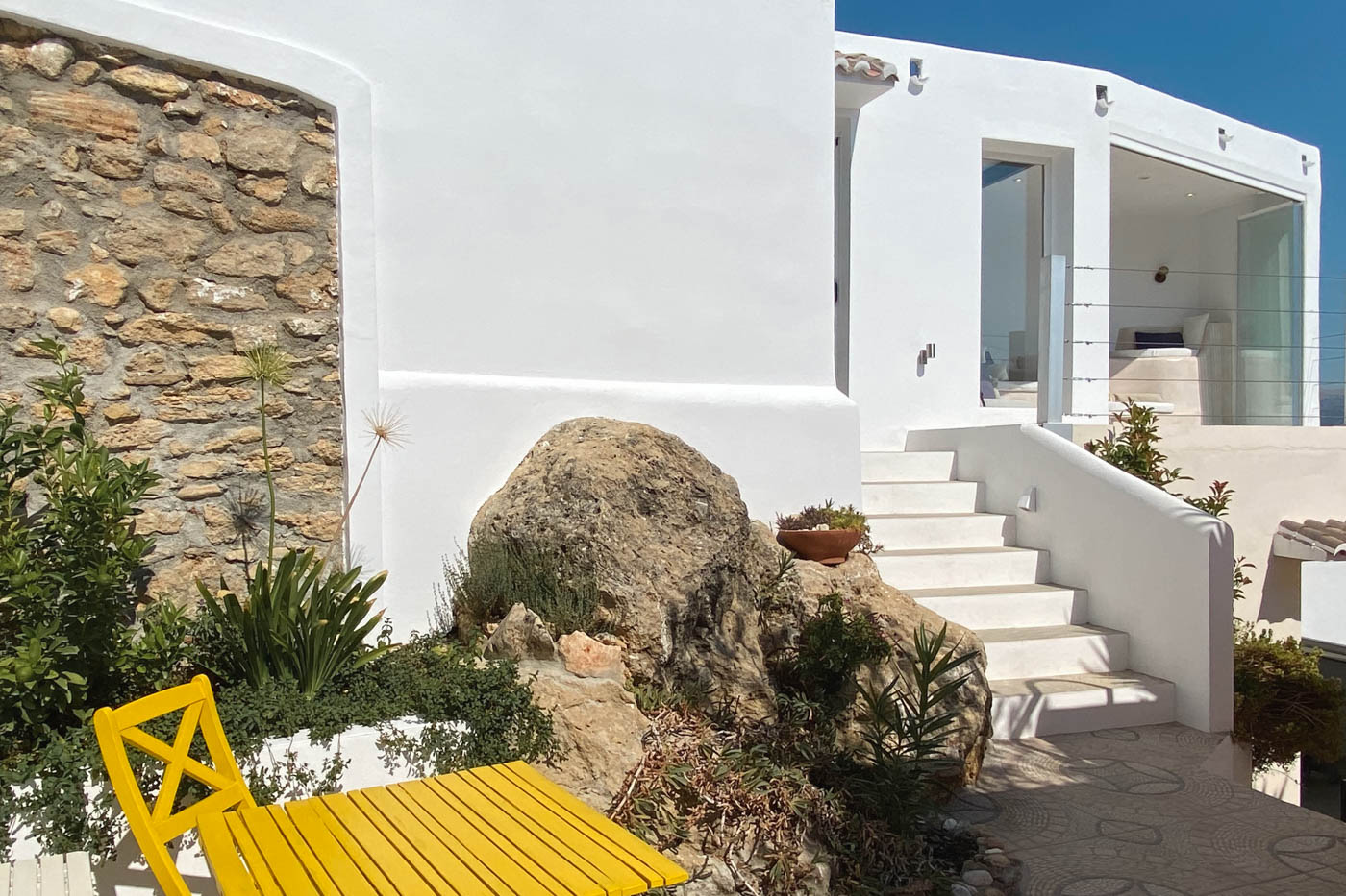 Steps to open plan kitchen / living / dining area